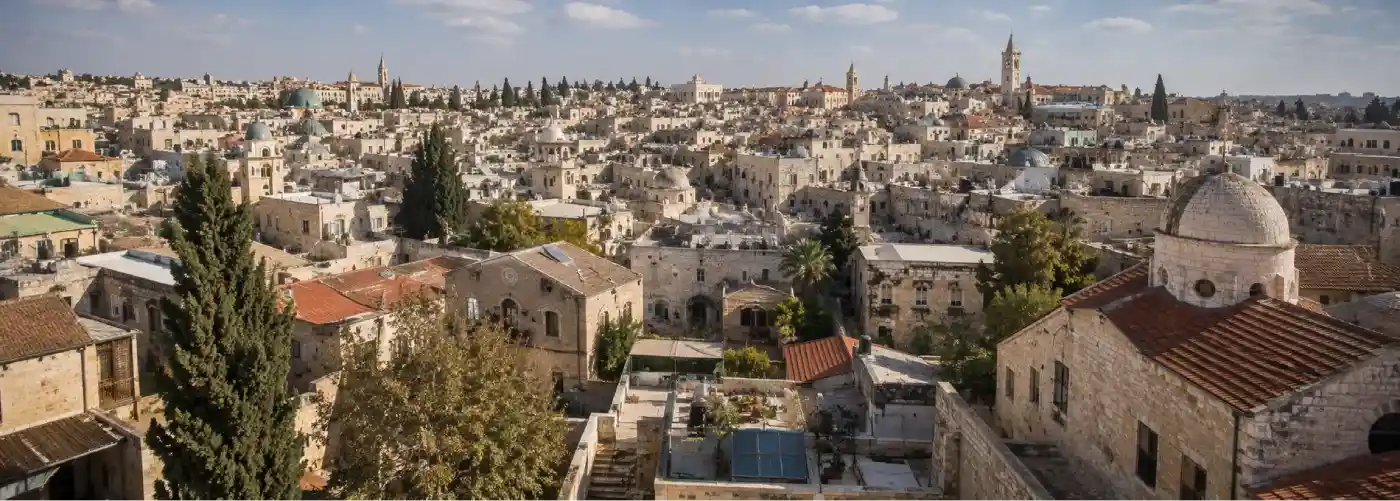 Old City rooftops and hills